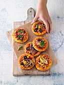 Mini pizzas with various toppings