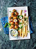 Asparagus platter with potatoes and herb dip