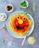 Children's spaghetti with tomato sauce and olives