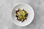 Salad with beetroot, fresh cabbage, feta cheese and sesame seeds