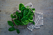 Fresh spinach in a basket