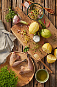 Preparation of black-feathered chicken with lemons and herbs