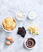 Ingredients for chocolate brownies with crinkle-cut crisps