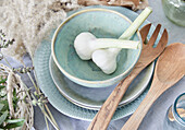 Garlic bulbs in a ceramic bowl
