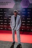 Xoel Lopez, winner of the Best Pop Album Award, on the red carpet at the MIN Independent Music Awards 2024, Zaragoza, Spain