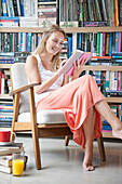 Woman Using Digital Tablet at Home