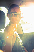 Woman Inside Car at Sunset