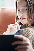 Teenage Girl Using Digital Tablet