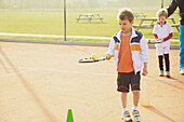 Children Practicing Tennis