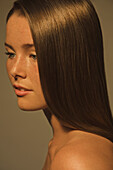 Close up Profile of Young Woman with Glossy Straight Hair