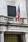 New York Stock Exchange, exterior view detail with American flag, Financial District, New York City, New York, USA