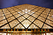 Paris. 1st district. Louvre Museum by night. The pyramid (architect: Ieoh Ming Pei). Main entrance.Mandatory credit of the architect architect: Ieoh Ming Pei