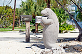 USA. Florida. The Keys. Marathon Island. Sombrero beach. Mailbox in the shape of a manatee.