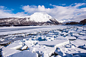 Norway,city of Tromso,Island of Senja,block of ice on the sides of a fjord