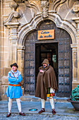 Spain,Rioja,Medieval Days of Briones (a festival declared of national tourist interest),two men costumed in front of the entrance of a Palace