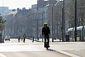 France,Nantes,44,Cours des 50 Otages,a man on a segway,winter