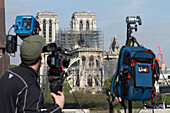 France,Paris,1st arrondissement,Ile de la Cite,cameraman filming the Cathedral Notre-Dame after the fire,April,17th 2019
