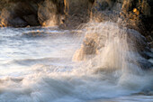 France,La Bernerie-en-Retz,44,foam splashing against the rocks at the edge of a beach