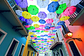 Usa,Porto Rico,San Juan. Fortaleza street. Umbrellas street