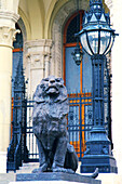 Europe,Hungary,Budapest. Lion statue front of Parlement building