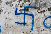 Wall and tag of a swastika