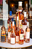 Collection of rose wines in a shop window