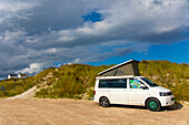 Converted van near a beach. Volkswagen Transporter