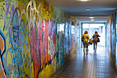 Wall with graffiti in a building hall