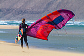 Europe,Spain,Canaria,Fuerteventura. Sotavento beach. Woman kitesurfing