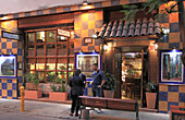 Chile,Santiago,restaurant,entrance,people,street scene,
