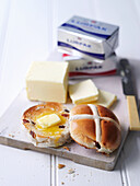 Hot cross buns with butter and lurpak