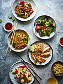 Asian wok vegetable mix with fish and fried noodles