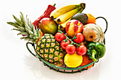 Basket with fresh fruit and vegetables