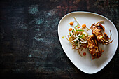 Deep-fried softshell crab with salad garnish