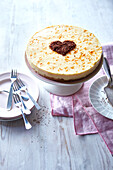 Cheesecake with chocolate heart decoration