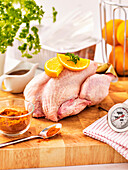 Raw turkey with oranges and spices ??