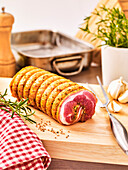 Pork roulade with mustard crust