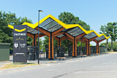 Solar panels on motorway electric car charging station