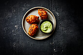 Deep-fried potatoes with coriander dip