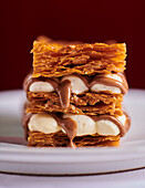 Mille-feuille with vanilla cream and praline sauce