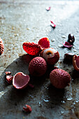 Lychees on a grey background