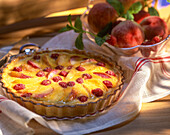 Clafoutis with white peaches and raspberries