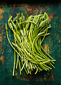 Wild asparagus on a rustic base