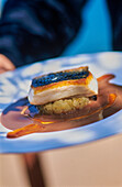 Sea bass with aubergine puree and olive sauce