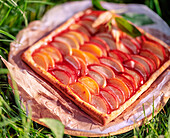 Peach tart with raspberry jam