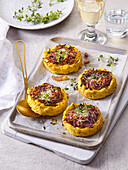 Potato and onion tartlets with bacon