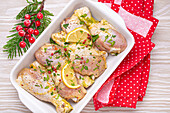 Marinated chicken drumsticks with herbs and lemon