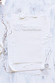 'Welcome' lettering on tea towel dusted with flour