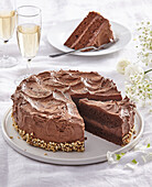 Chocolate cream cake with chocolate almonds