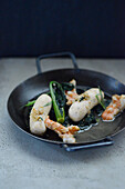Baltic prawn sausages with black cabbage